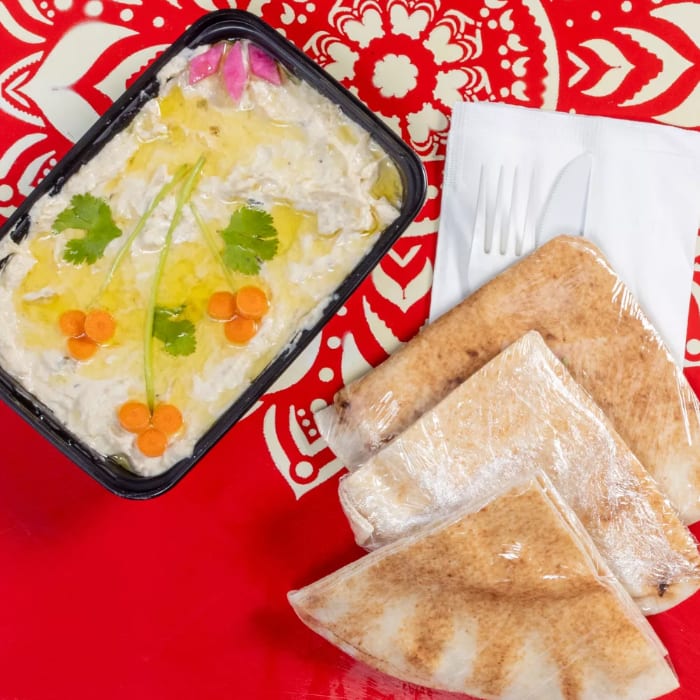 Mutabal (Baba Ganuje) with Pita.